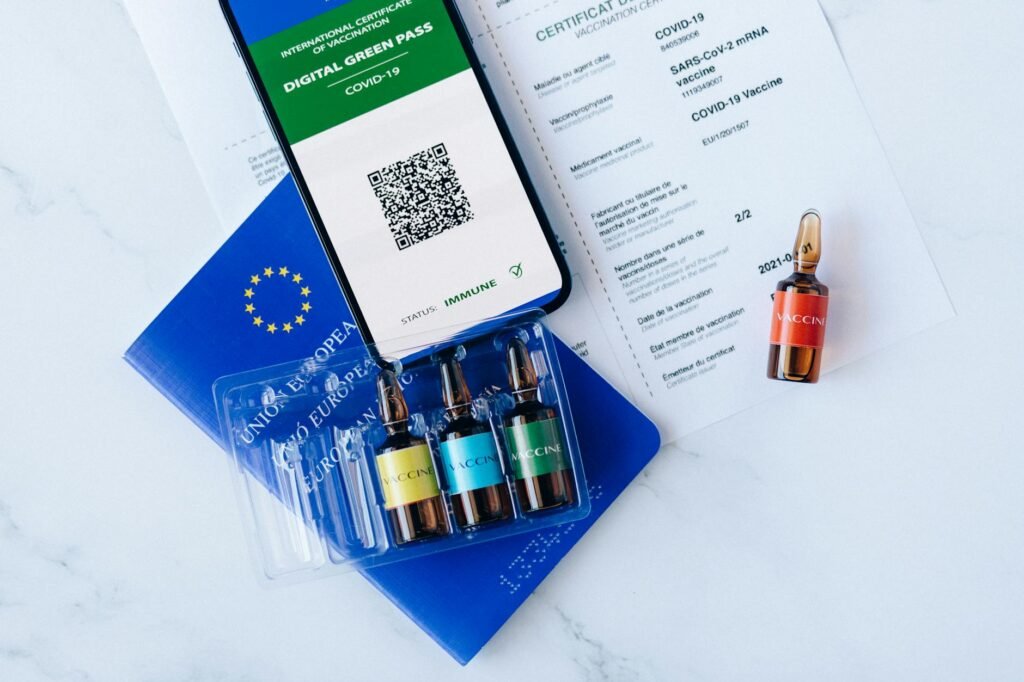 electricity certification documents on desk with blueprint background